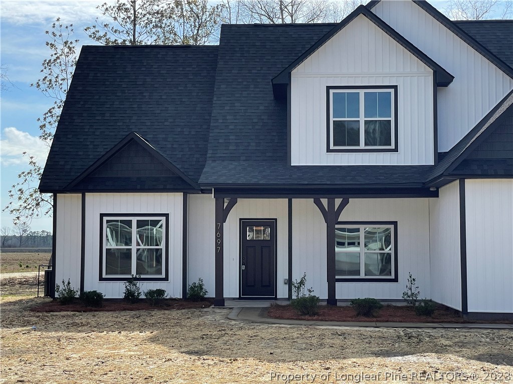 7697 Rufus Johnson Road Fayetteville, NC 28306 - Photo 2 of 16 a front view of a house