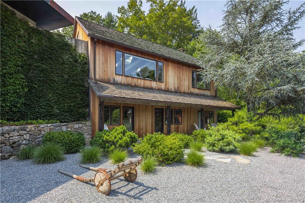 4 Good Hill Road Weston, CT 06883 - Photo 5 of 40 a front view of house with yard and green space