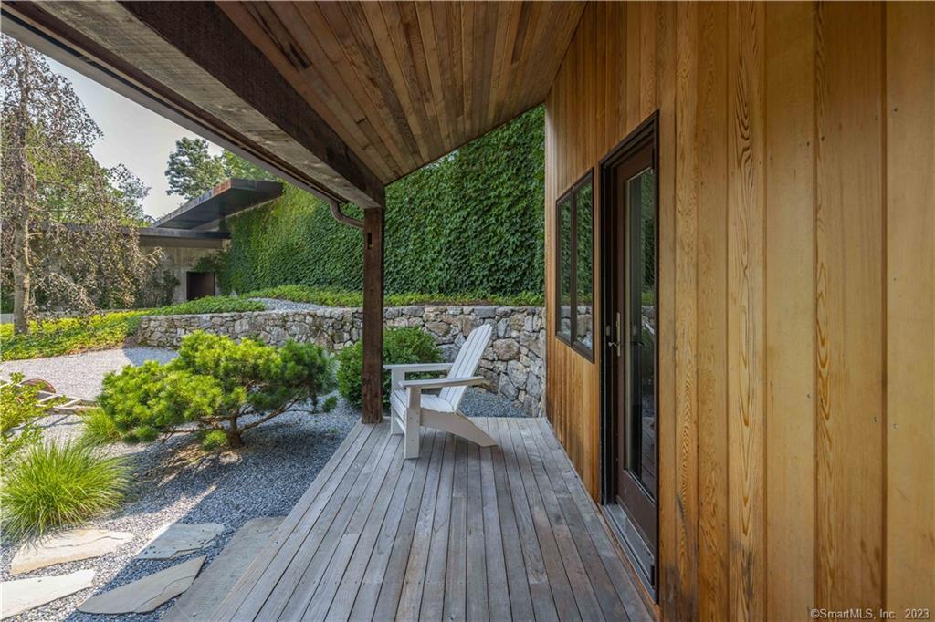 4 Good Hill Road Weston, CT 06883 - Photo 6 of 40 a view of balcony with chairs and potted plants