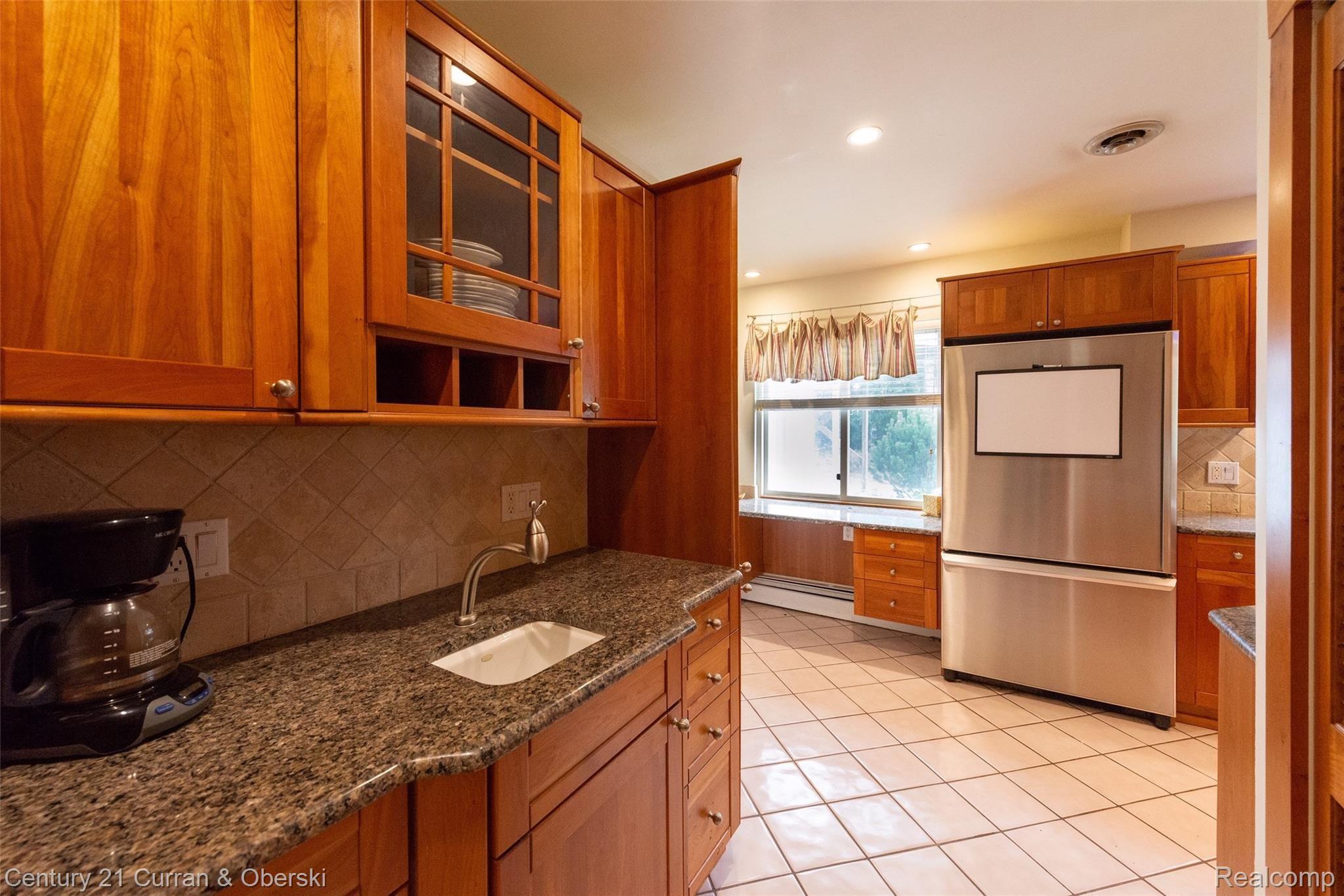 3011 Bamlet Road Royal Oak, MI 48073 - Photo 9 of 59 Butler’s pantry with sink, more cabinets.