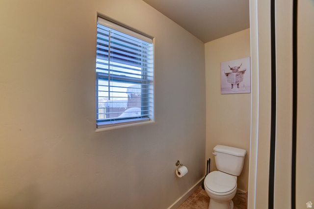3853 South Red Valley Circle, Unit 22A1 Moab, UT 84532 - Photo 13 of 28 Bathroom featuring toilet and baseboards