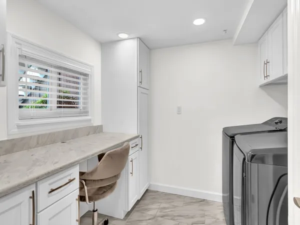 a room with a table and chairs