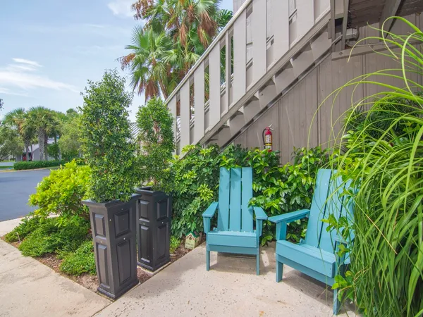 a view of a lake with houses in the back