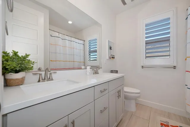 a outdoor living space with furniture and a floor to ceiling window