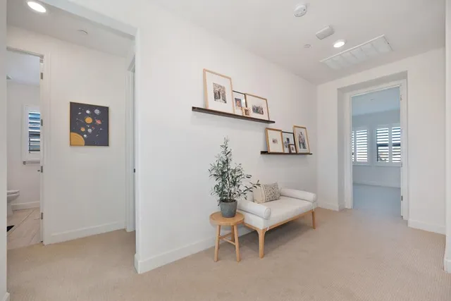 a view of a house with swimming pool and a porch