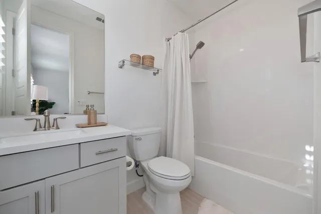 a view of a house with a yard porch and sitting area