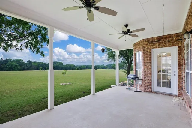 a view of house with outdoor space