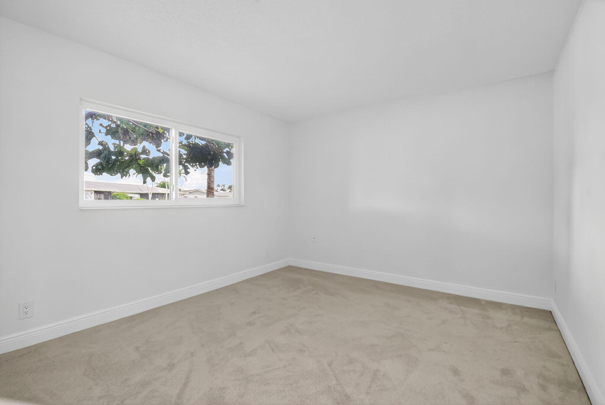 6096 Dusenburg Road Delray Beach, FL 33484 - Photo 14 of 28 an empty room with windows