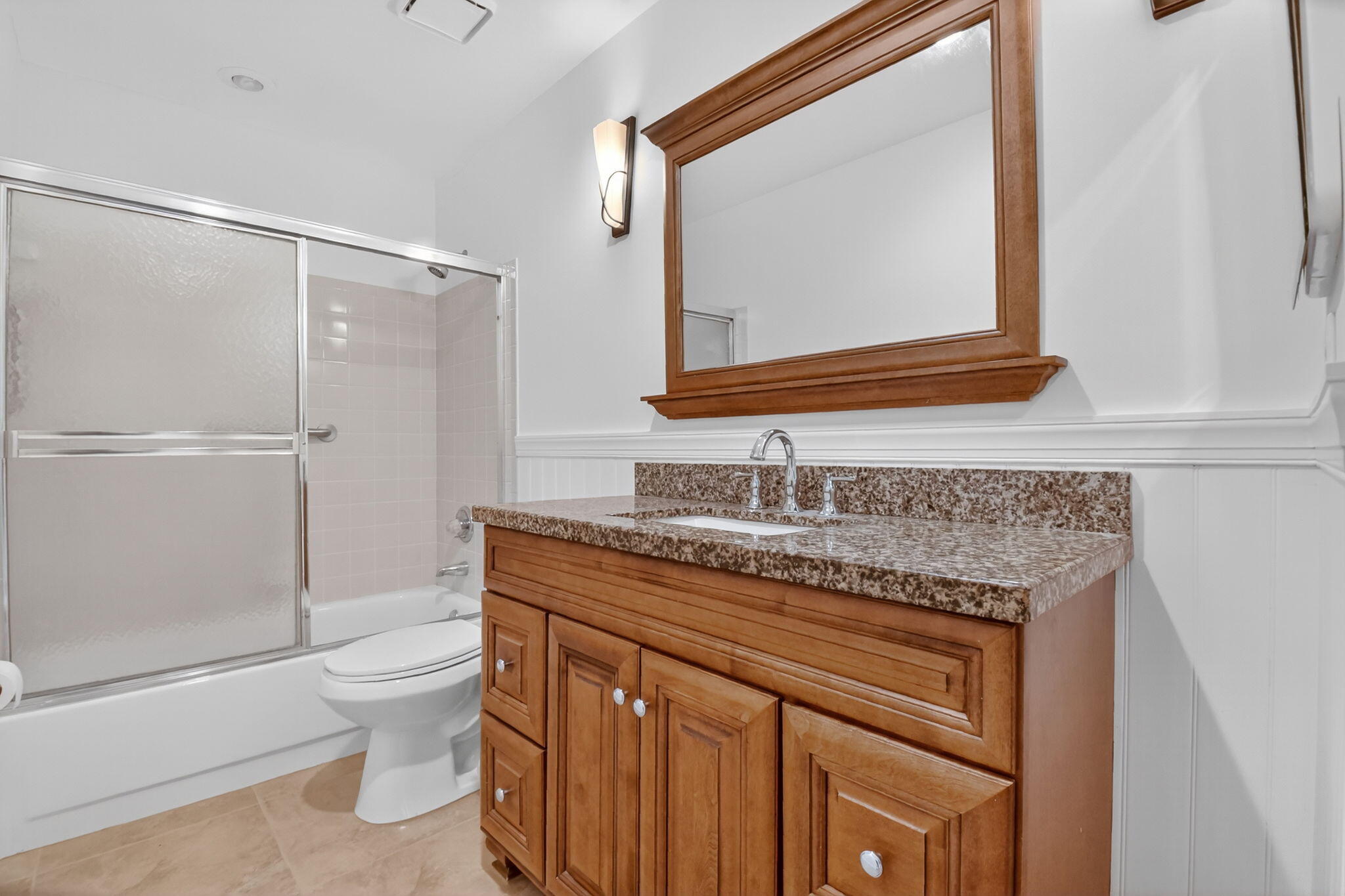 6096 Dusenburg Road Delray Beach, FL 33484 - Photo 16 of 28 a bathroom with a granite countertop sink toilet and shower