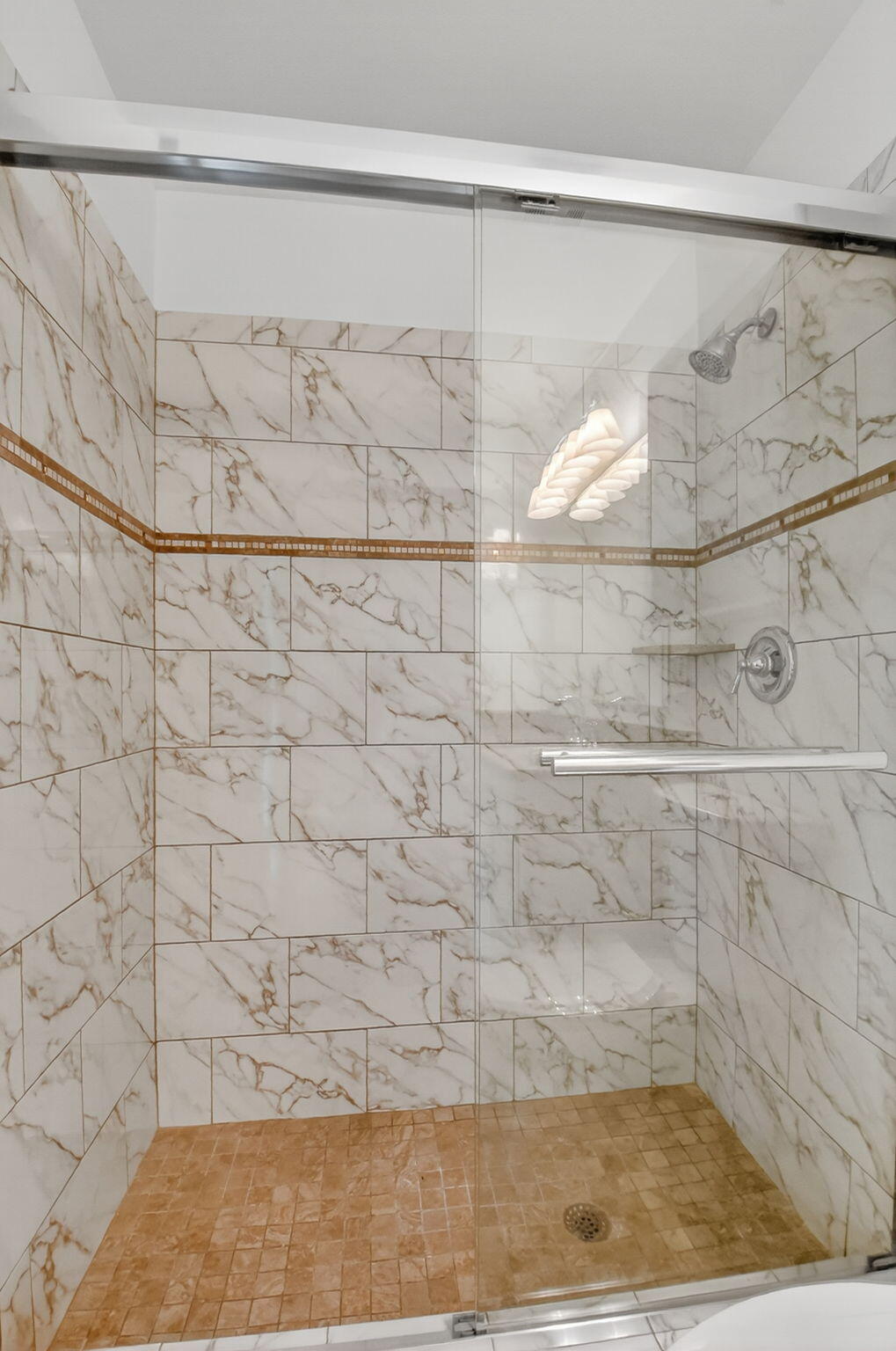 6096 Dusenburg Road Delray Beach, FL 33484 - Photo 24 of 28 a bathroom with a shower
