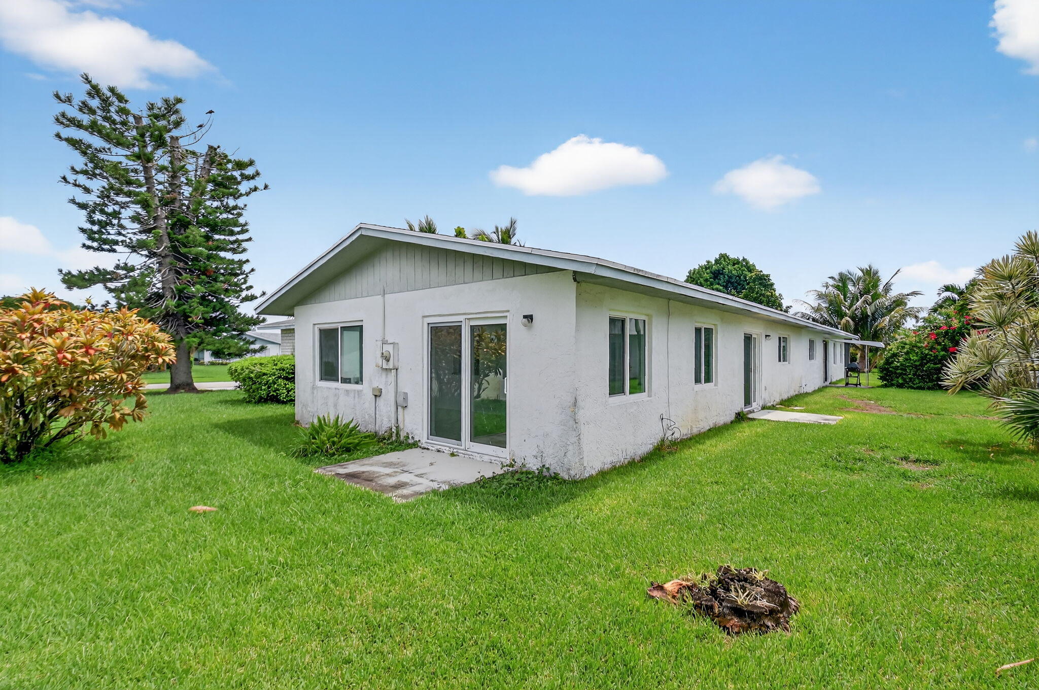 6096 Dusenburg Road Delray Beach, FL 33484 - Photo 28 of 28 a front view of house with yard and green space