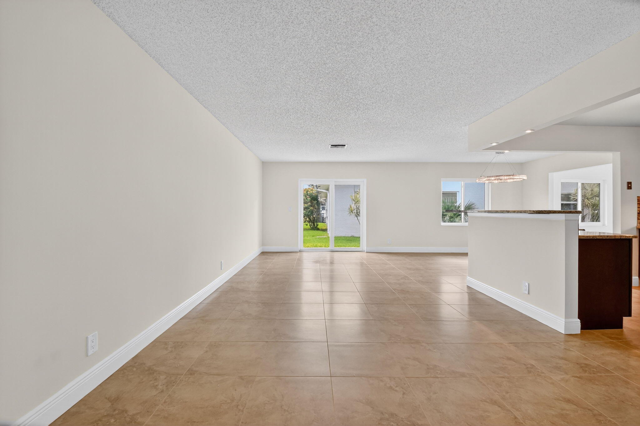 6096 Dusenburg Road Delray Beach, FL 33484 - Photo 8 of 28 a view of a livingroom with wooden floor