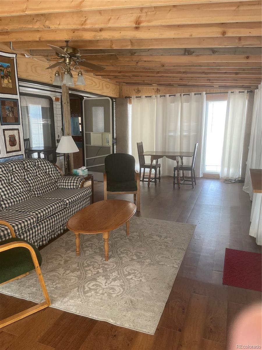 124 Clubcar Road Fairplay, CO 80440 - Photo 4 of 12 a view of a livingroom with furniture and window