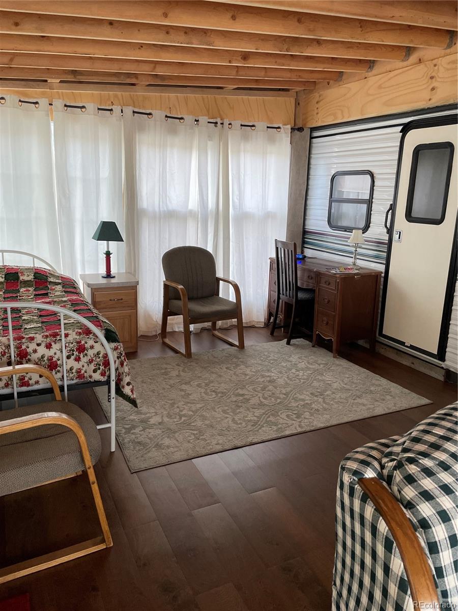 124 Clubcar Road Fairplay, CO 80440 - Photo 6 of 12 a room with furniture and a rug