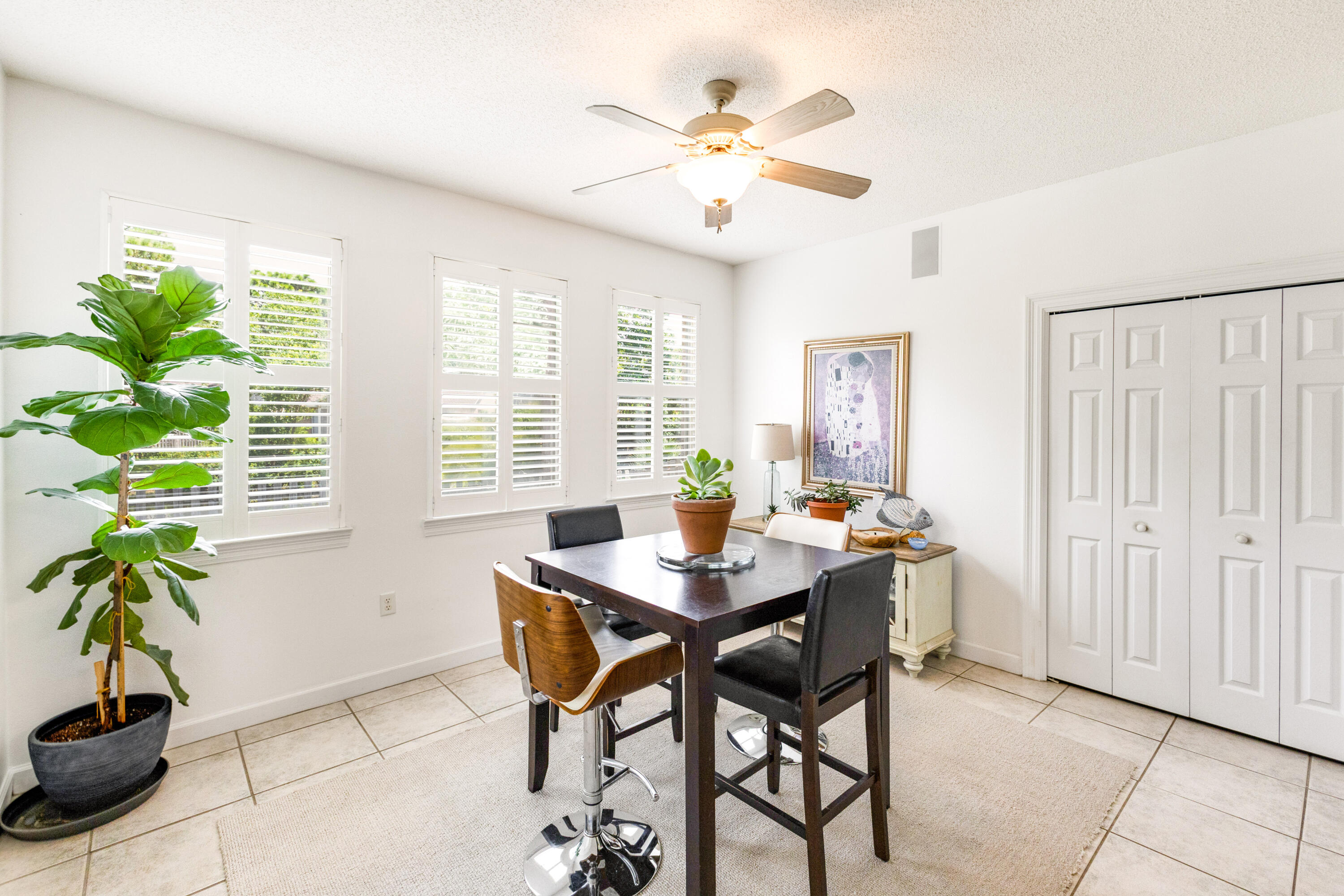 12 Corte Lago Santa Rosa Beach, FL 32459 - Photo 15 of 59 a view of a dining room with furniture and a potted plant