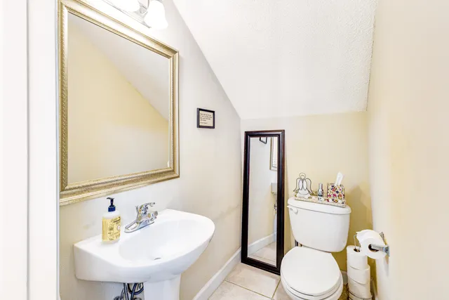 a view of a swimming pool with a yard