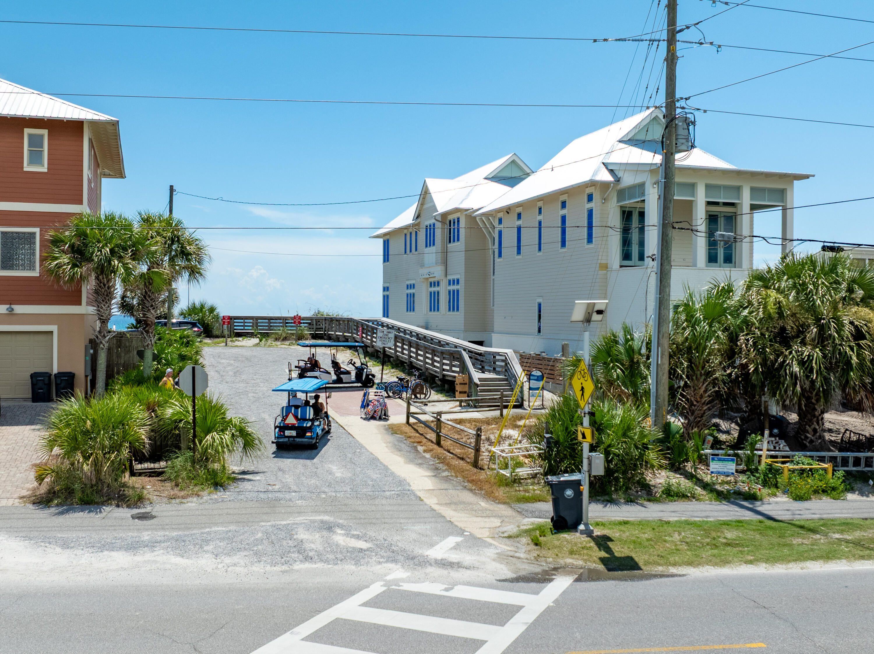 12 Corte Lago Santa Rosa Beach, FL 32459 - Photo 46 of 59 a view of a patio with a table and chairs under an umbrella