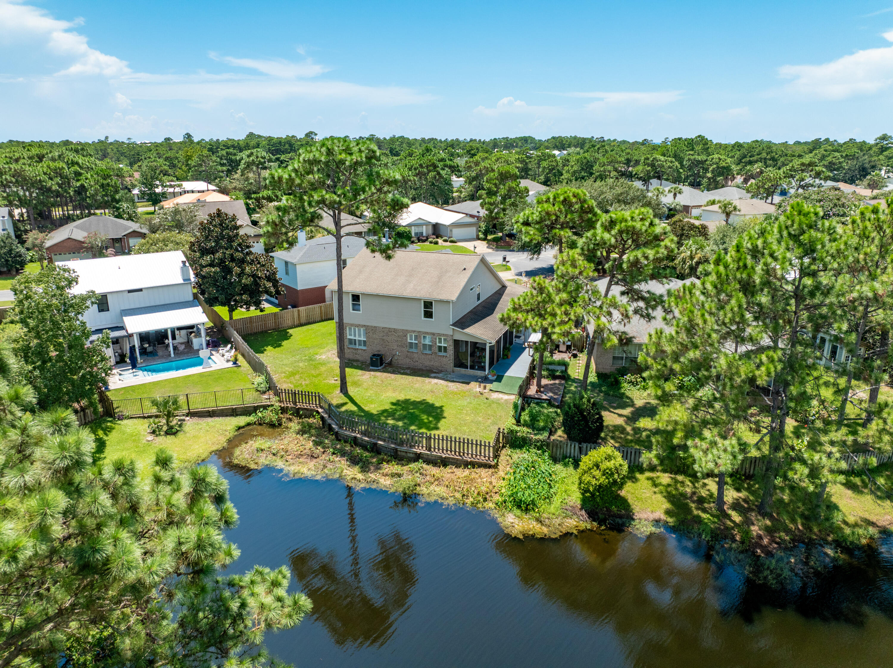 12 Corte Lago Santa Rosa Beach, FL 32459 - Photo 6 of 59 an aerial view of a house with a garden and lake view