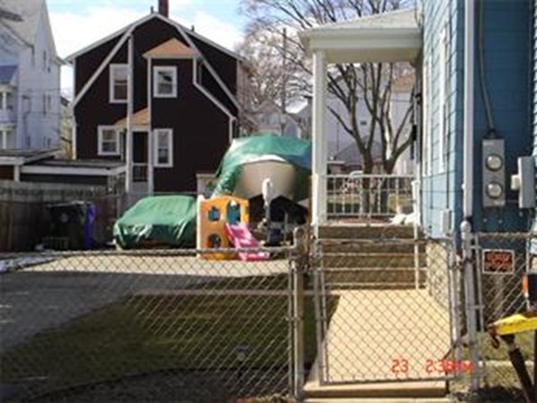 161 Mott Street Fall River, MA 02721 - Photo 13 of 24 a front view of a house with a yard