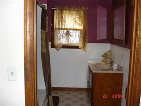 161 Mott Street Fall River, MA 02721 - Photo 18 of 24 a bathroom with a sink and a window