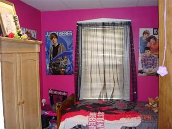 161 Mott Street Fall River, MA 02721 - Photo 5 of 24 a view of a room with bed and a window