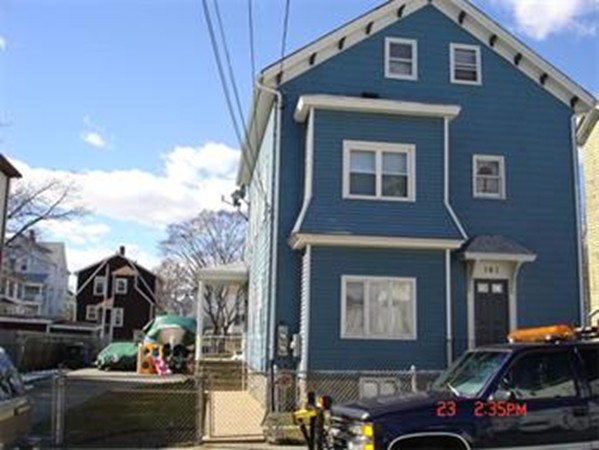 161 Mott Street Fall River, MA 02721 - Photo 8 of 24 a front view of a house with a yard