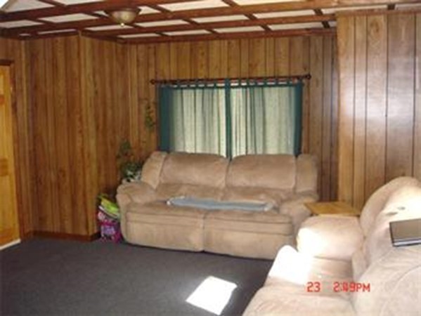 161 Mott Street Fall River, MA 02721 - Photo 10 of 24 a bed sitting in a room next to a window