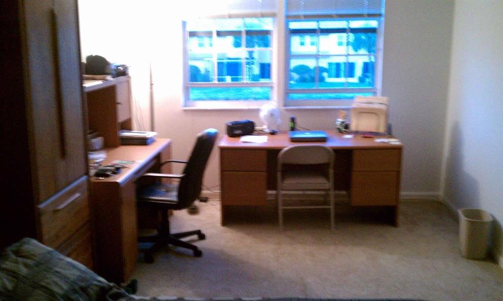 9395 Boca River Circle Boca Raton, FL 33434 - Photo 12 of 18 a view of a workspace with furniture and a window