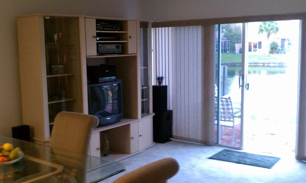 9395 Boca River Circle Boca Raton, FL 33434 - Photo 8 of 18 a view of livingroom with furniture and closet