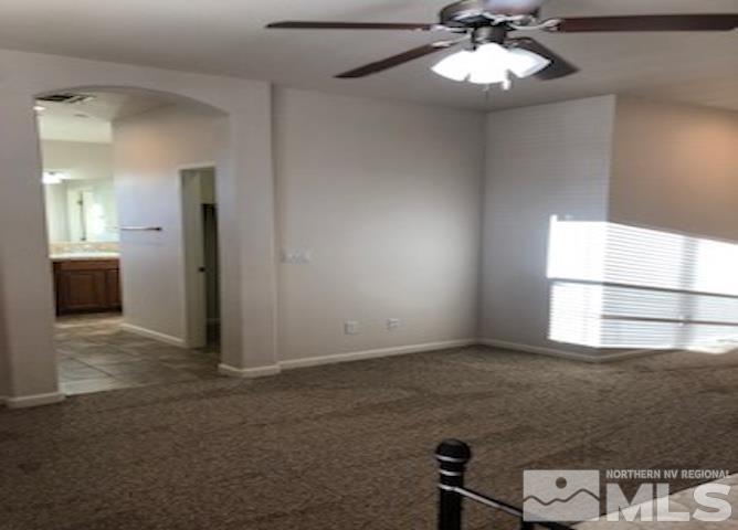 1775 Wind Ranch Road, Unit B Reno, NV 89521 - Photo 23 of 27 a view of an empty room and window