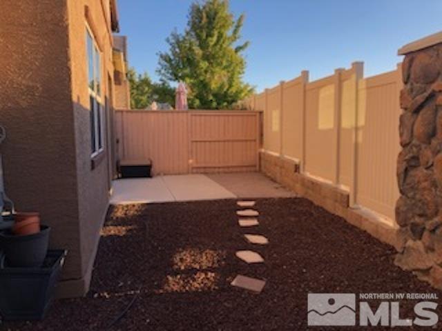 1775 Wind Ranch Road, Unit B Reno, NV 89521 - Photo 25 of 27 a backyard of a house