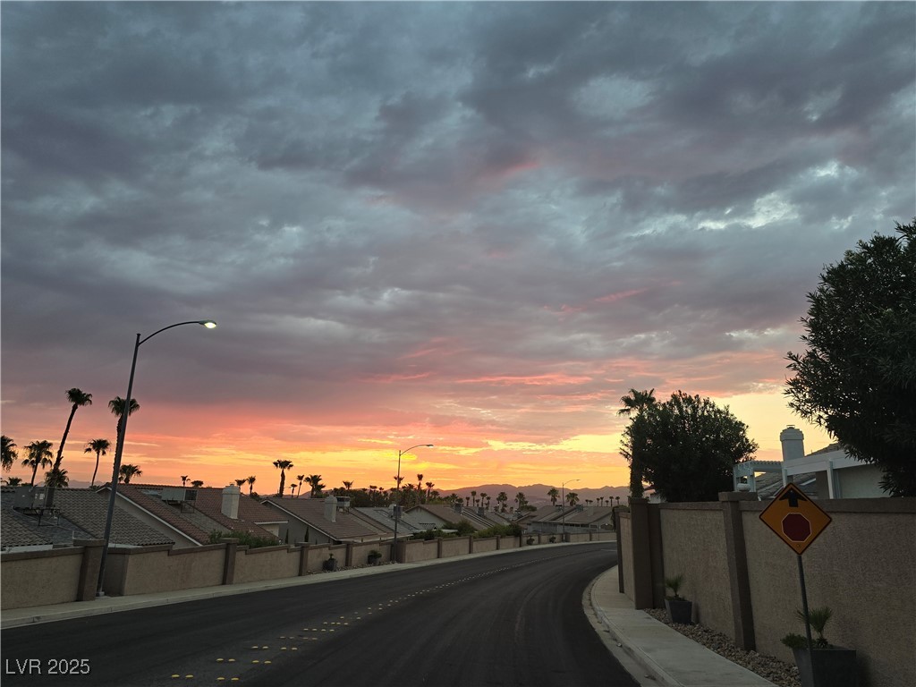 853 Rusty Anchor Way Henderson, NV 89002 - Photo 47 of 76 View of road with sidewalks, a residential view, street lighting, and traffic signs