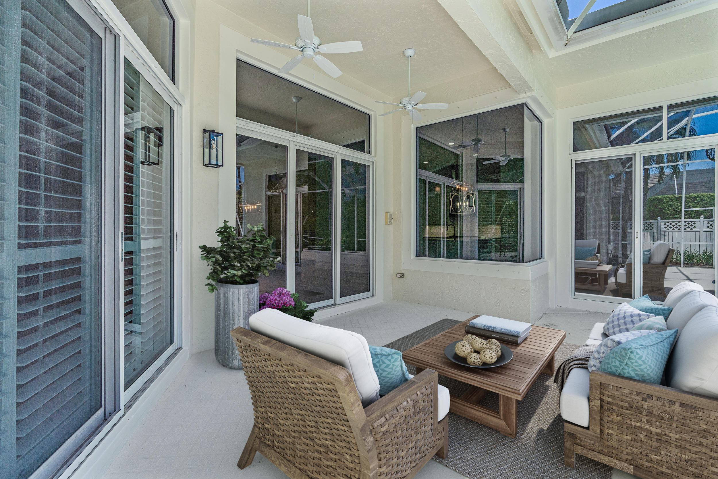 19866 Loxahatchee Pointe Drive Jupiter, FL 33458 - Photo 11 of 43 a living room with furniture and a potted plant