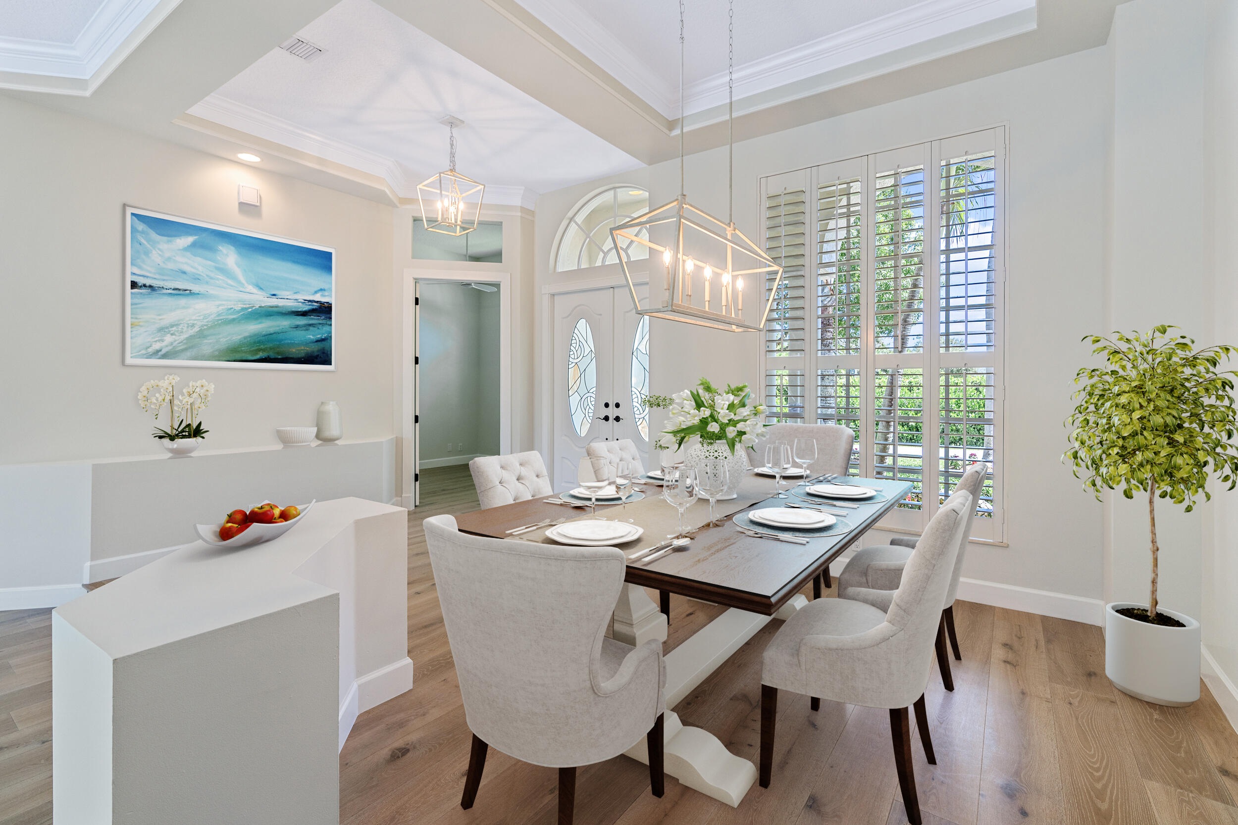 19866 Loxahatchee Pointe Drive Jupiter, FL 33458 - Photo 19 of 43 a view of a dining room with furniture and wooden floor
