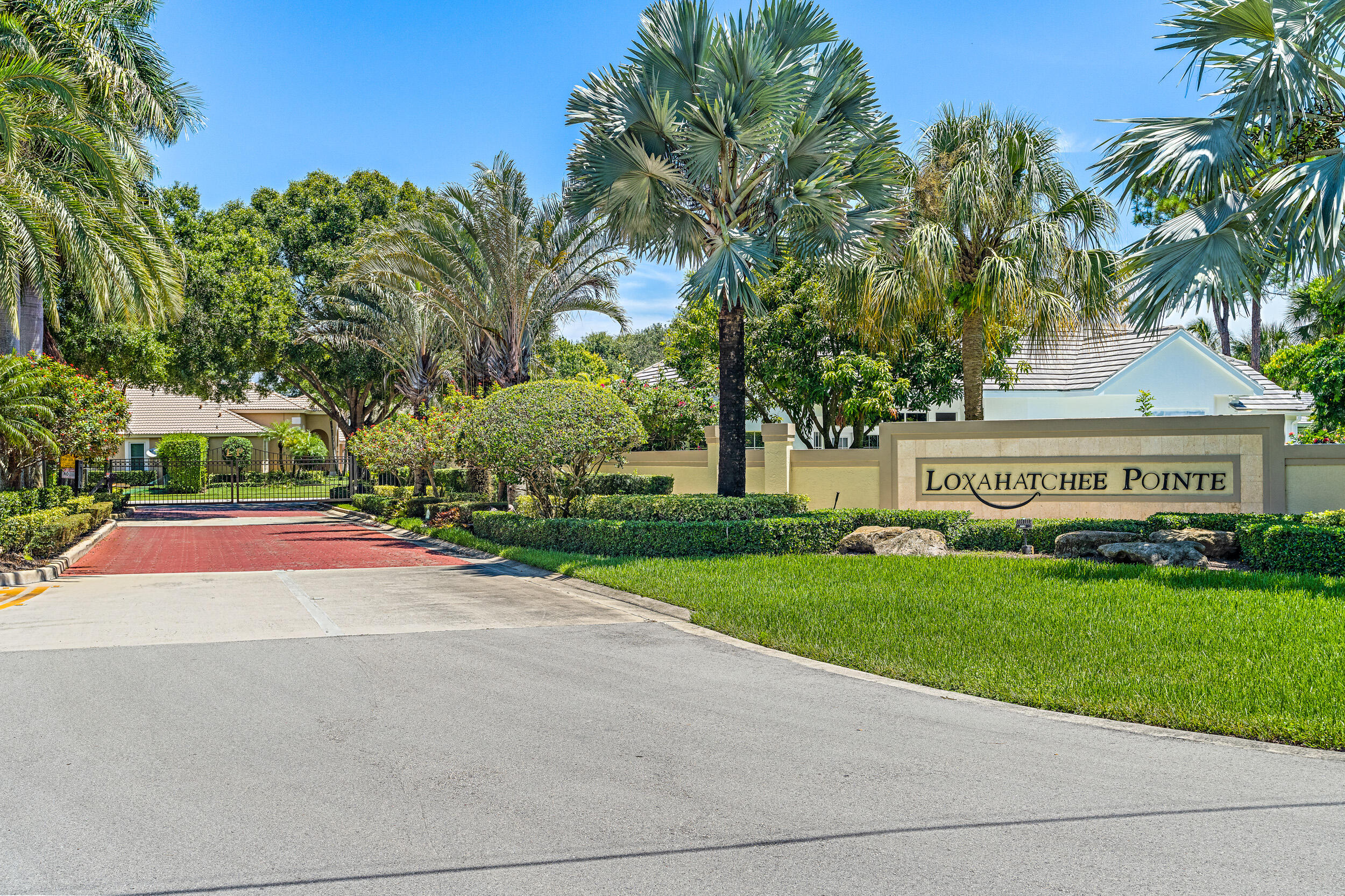 19866 Loxahatchee Pointe Drive Jupiter, FL 33458 - Photo 29 of 43 a view of house with outdoor space and garden