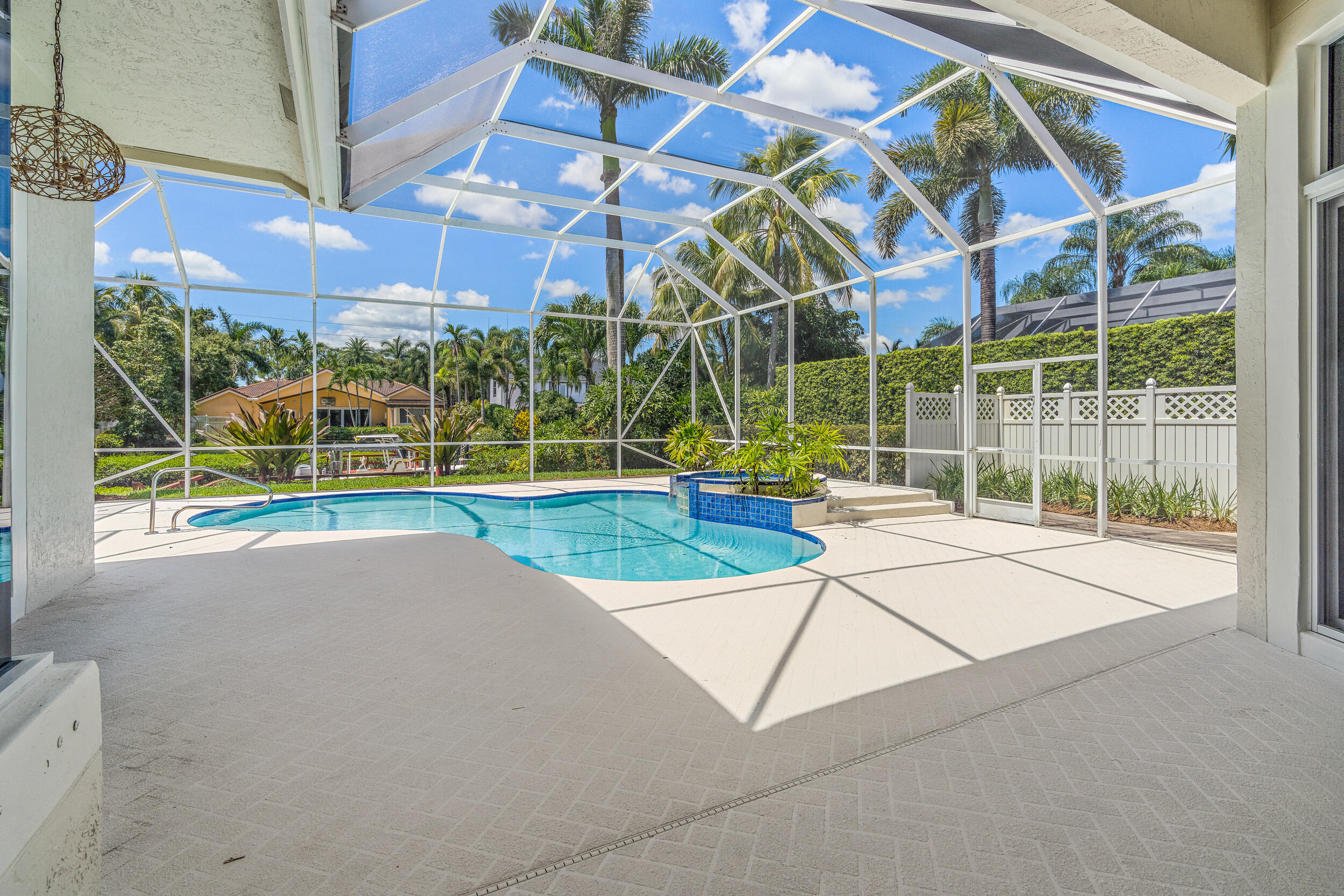 19866 Loxahatchee Pointe Drive Jupiter, FL 33458 - Photo 9 of 43 a view of a playground with a house