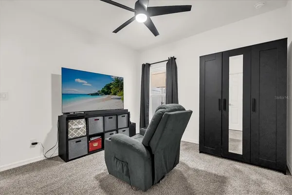 a living room with furniture and a window