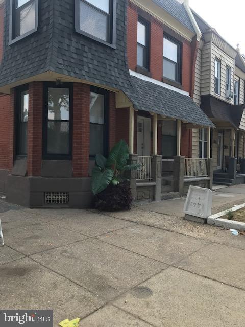1600 Rowan Street Philadelphia, PA 19140 - Photo 3 of 10 a view of a brick house with many windows