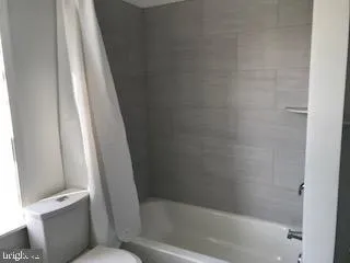 a bathroom with a bathtub