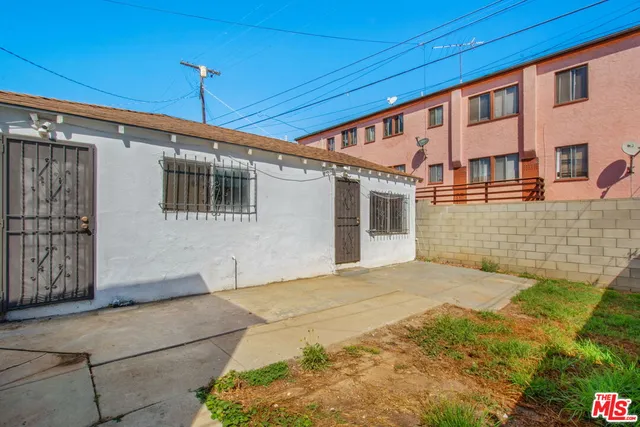 a front view of a house with a outdoor space