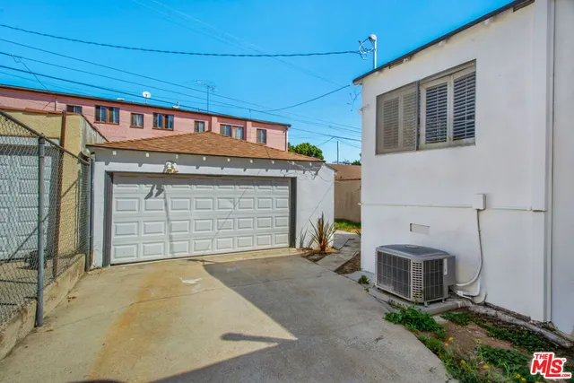 a front view of a house with a garage