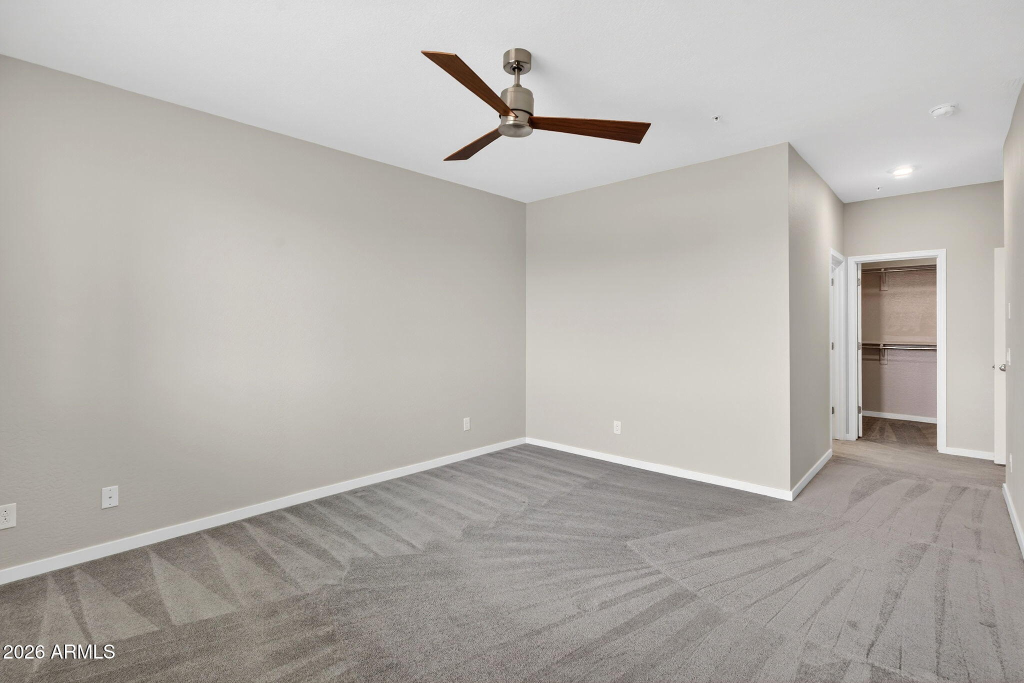 3900 East Baseline Road, Unit 149 Phoenix, AZ 85042 - Photo 18 of 54 wooden floor in an empty room