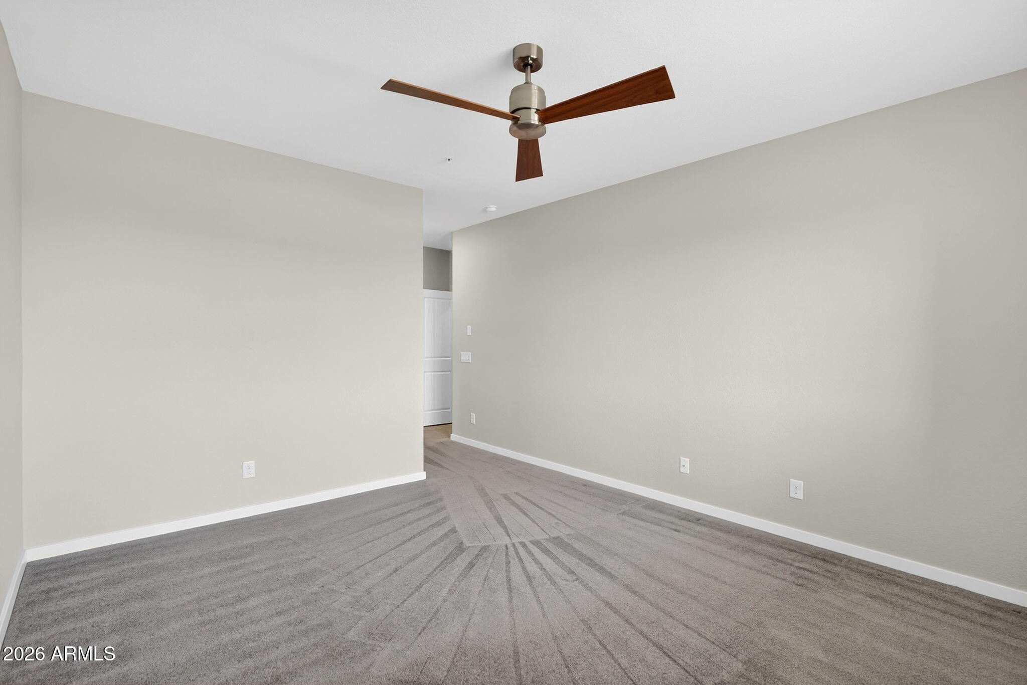 3900 East Baseline Road, Unit 149 Phoenix, AZ 85042 - Photo 19 of 54 a view of a room with wooden floor