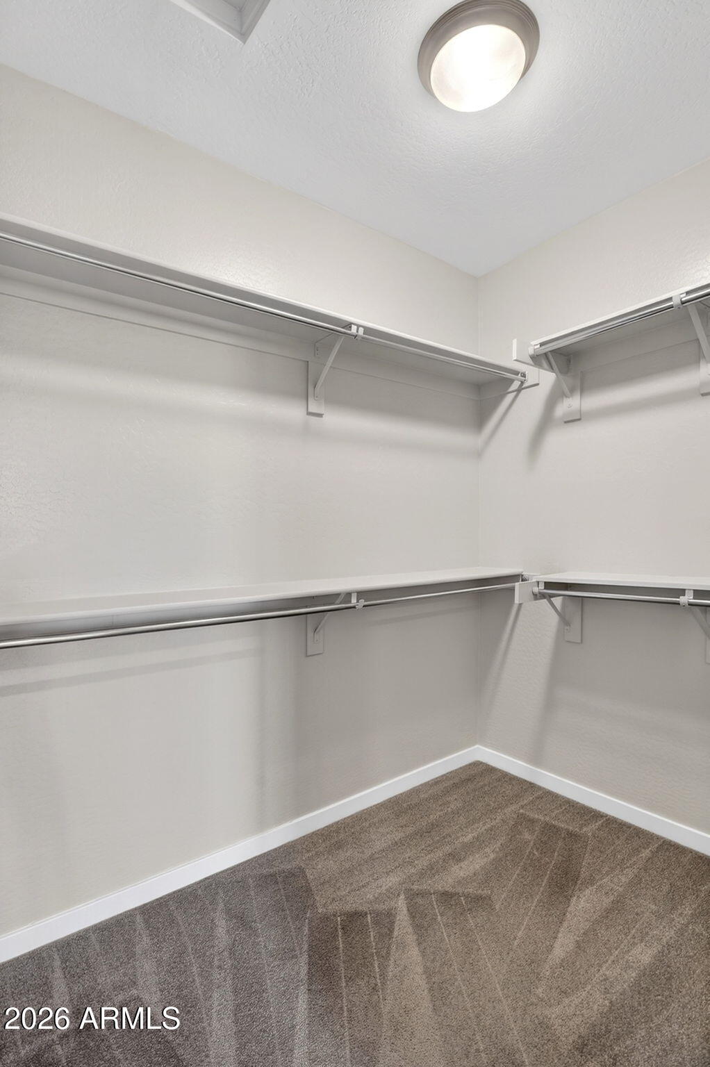3900 East Baseline Road, Unit 149 Phoenix, AZ 85042 - Photo 23 of 54 a view of an empty walk in closet