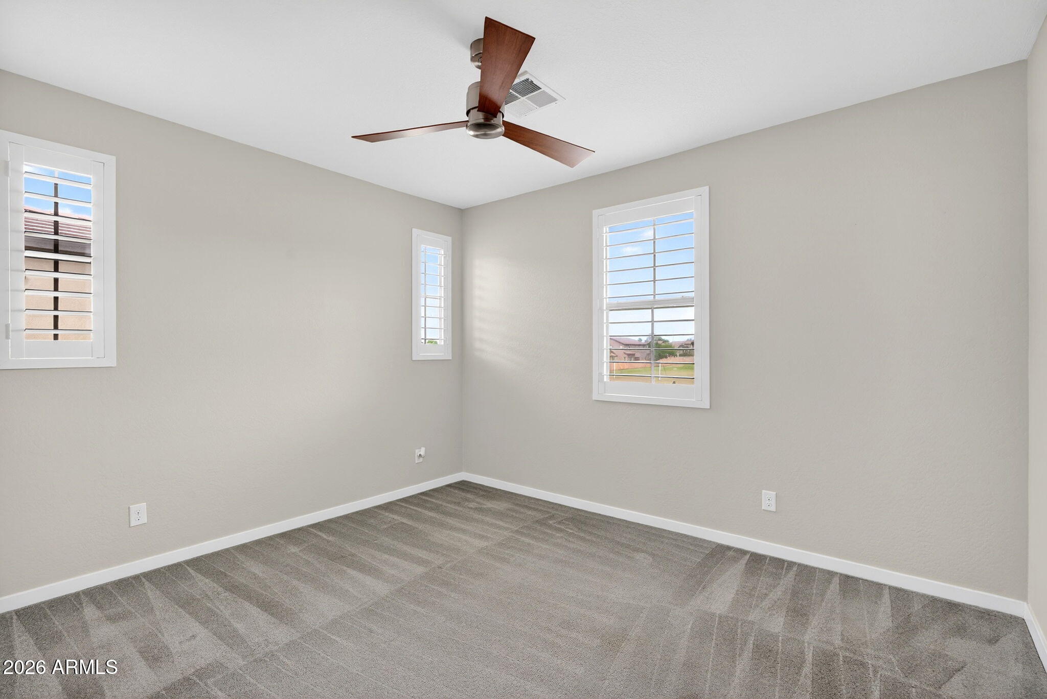 3900 East Baseline Road, Unit 149 Phoenix, AZ 85042 - Photo 24 of 54 an empty room with a window