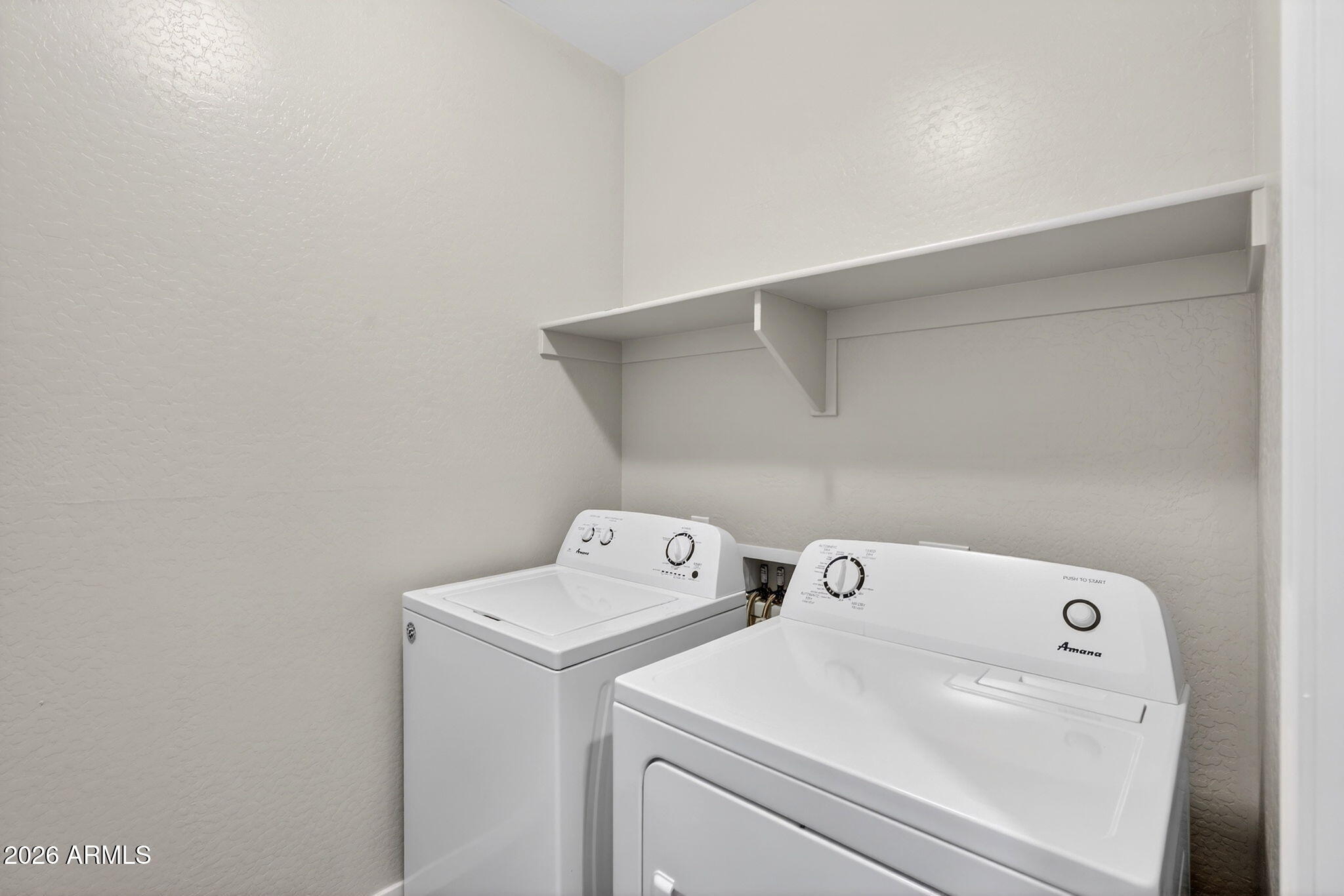 3900 East Baseline Road, Unit 149 Phoenix, AZ 85042 - Photo 30 of 54 a utility room with dryer and washer