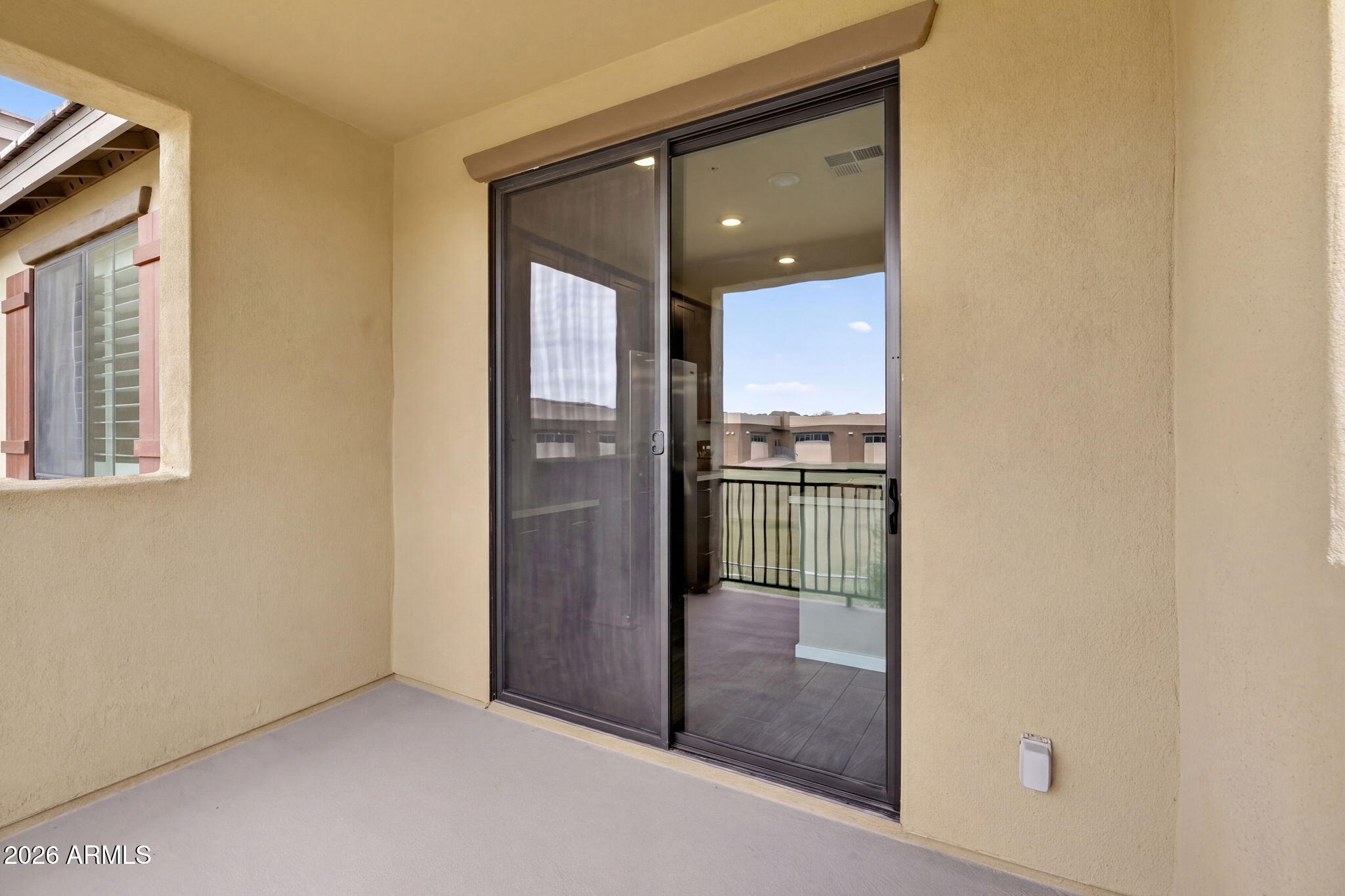 3900 East Baseline Road, Unit 149 Phoenix, AZ 85042 - Photo 33 of 54 a view of a hallway with a elevator