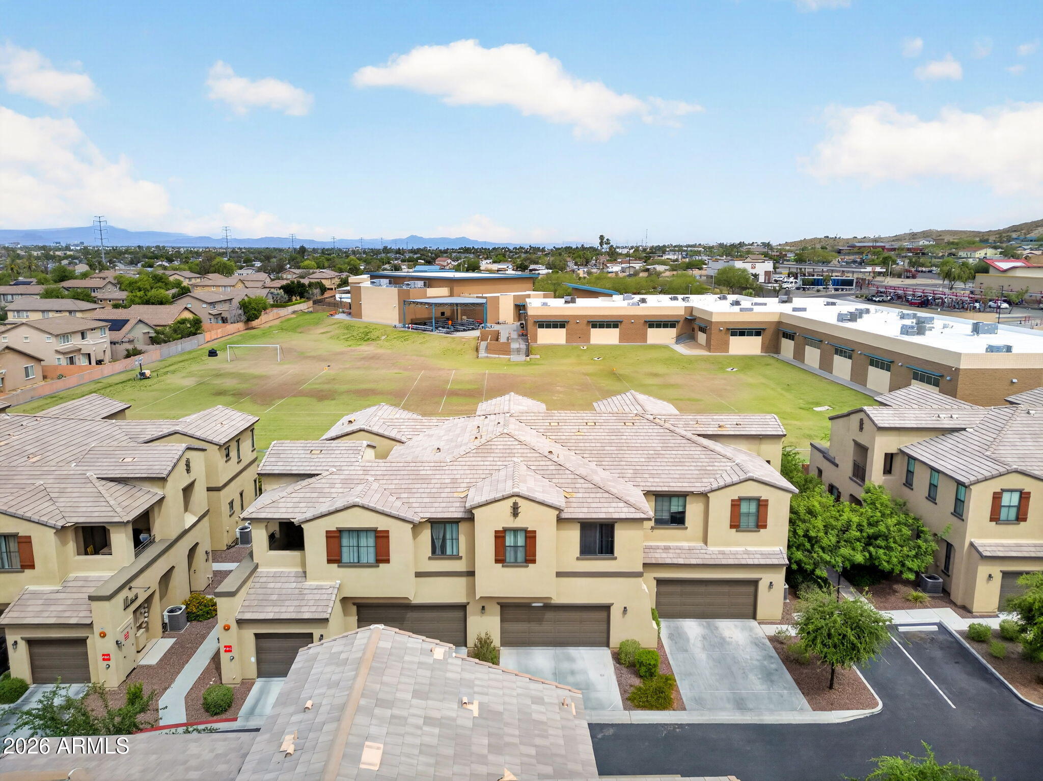 3900 East Baseline Road, Unit 149 Phoenix, AZ 85042 - Photo 35 of 54 an aerial view of residential houses with outdoor space and ocean view