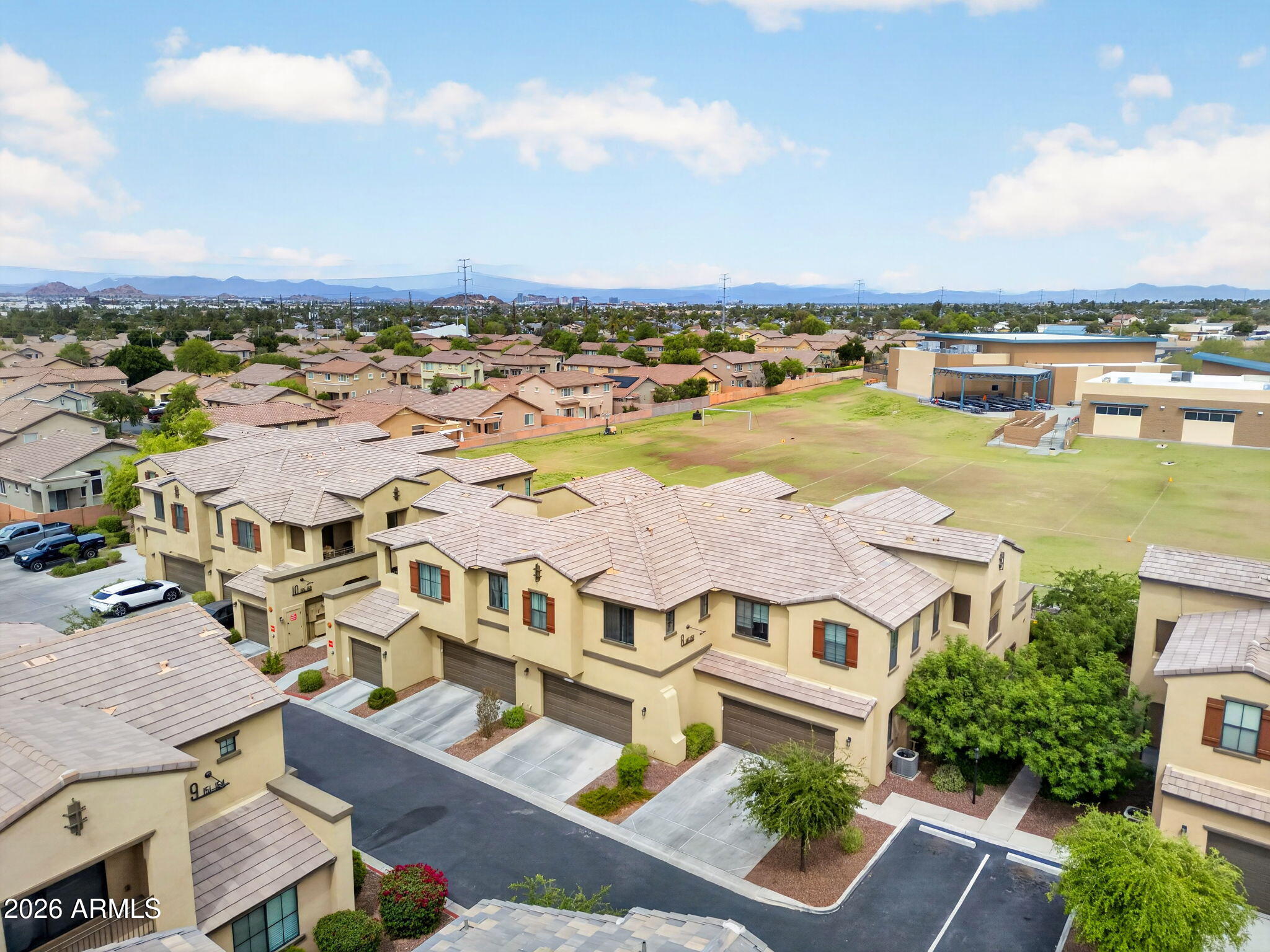 3900 East Baseline Road, Unit 149 Phoenix, AZ 85042 - Photo 37 of 54 an aerial view of residential houses with outdoor space and ocean