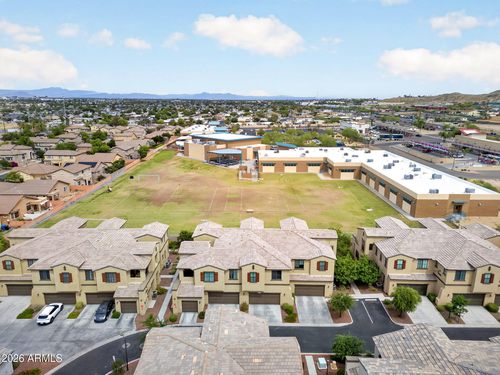 3900 East Baseline Road, Unit 149 Phoenix, AZ 85042 - Photo 38 of 54 a view of a city with lawn chairs